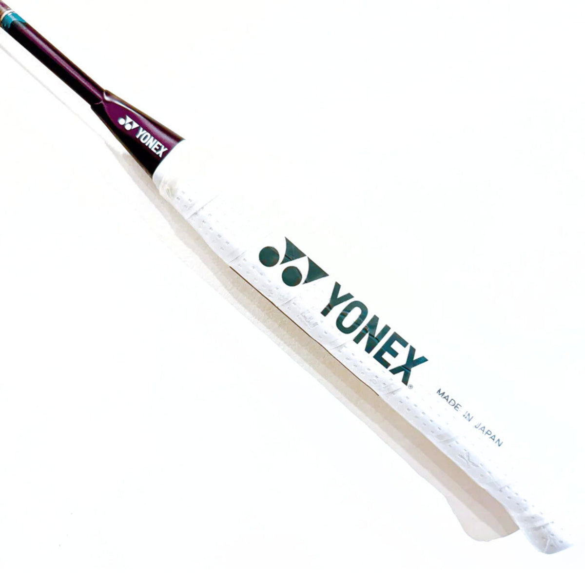 Yonex badminton racket on a white background