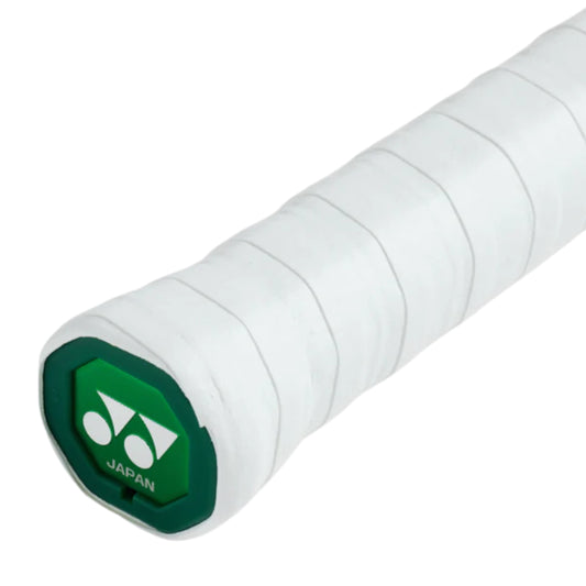 White tennis racket grip with green accent and 'Yonex Japan' text on a white background