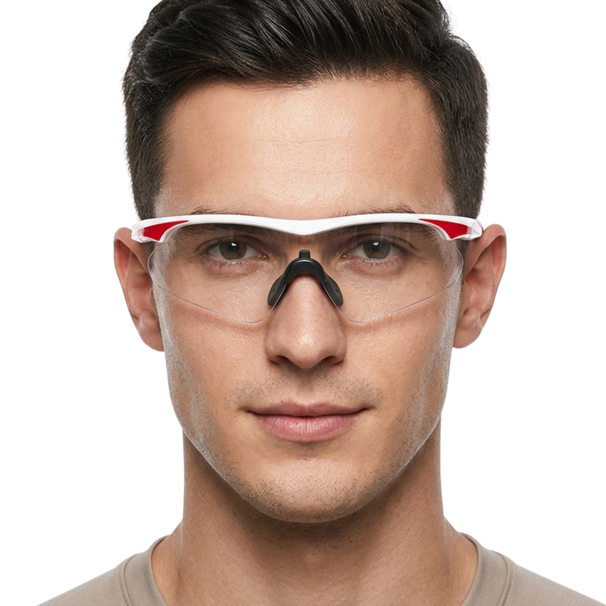 Person wearing a clear glasses with red and white frame on a plain background