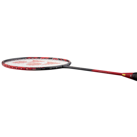 Red and black badminton racket on a white background