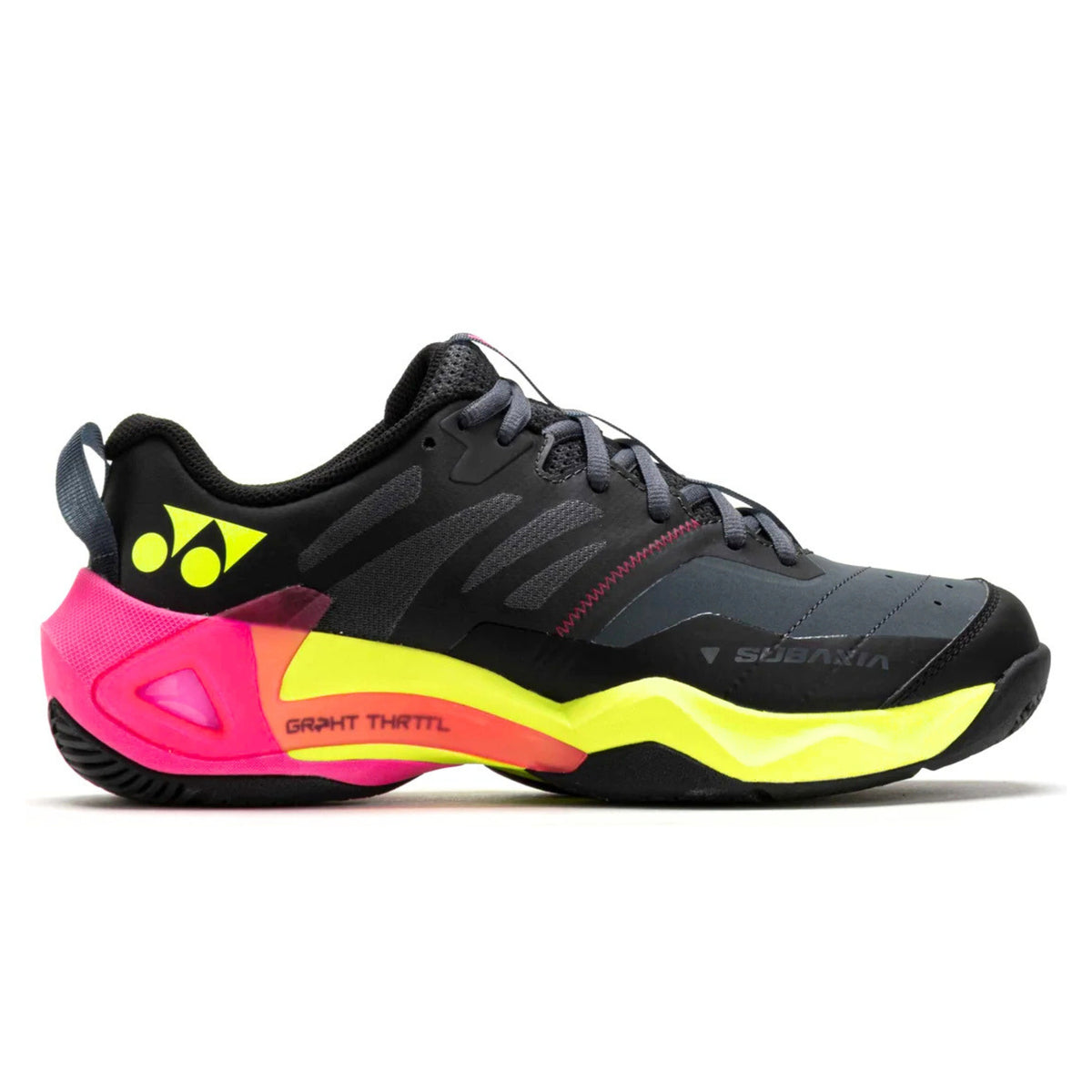 Black Yonex tennis shoe with pink and yellow sole on a white background