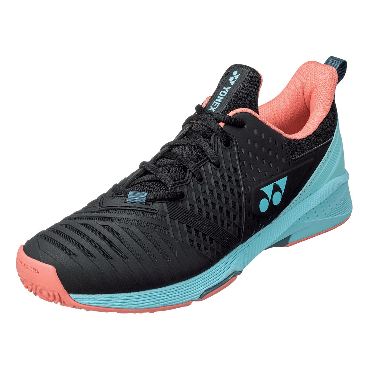 Black Yonex tennis shoe with orange and blue sole on a white background
