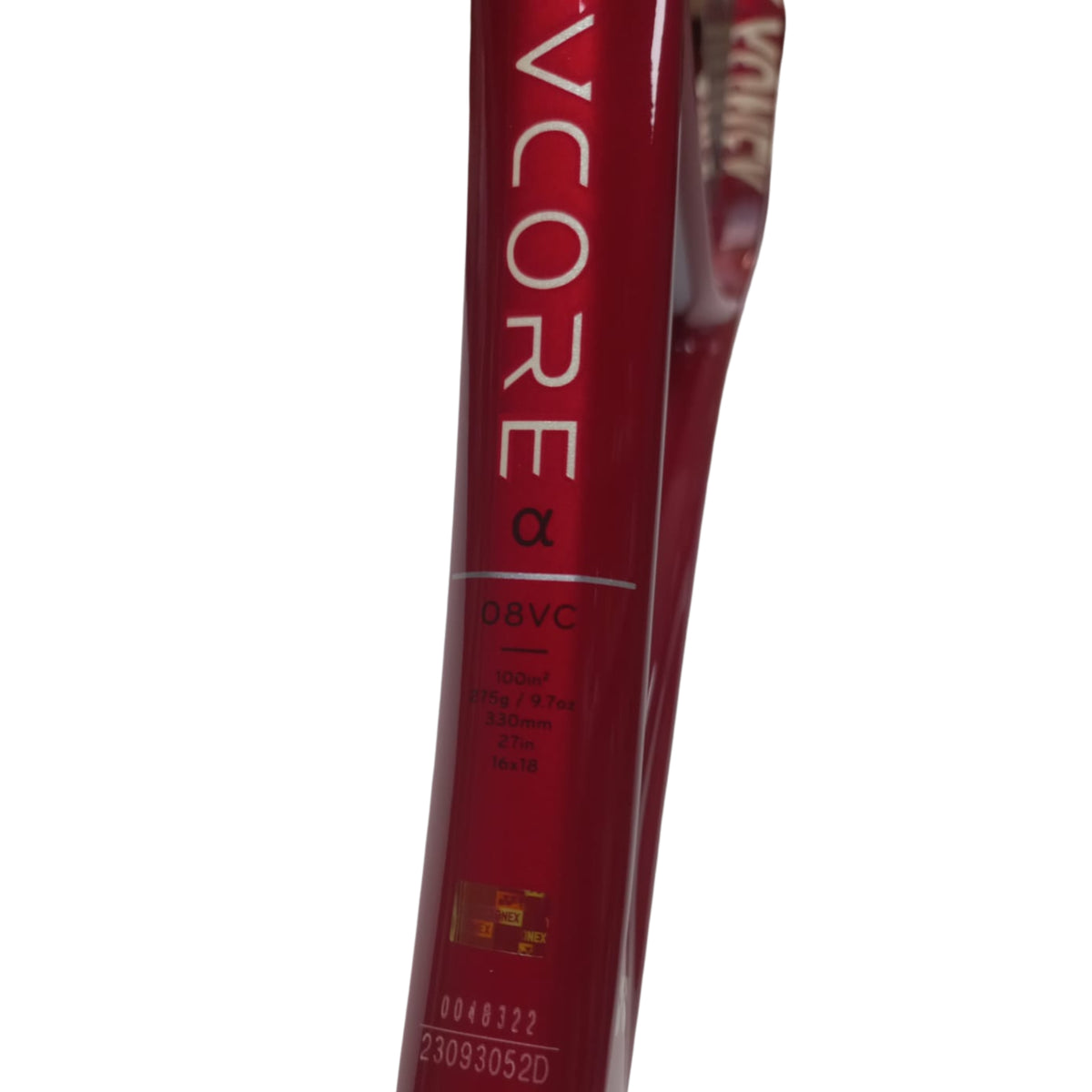 Red tennis racket with 'Vcore' branding on a white background