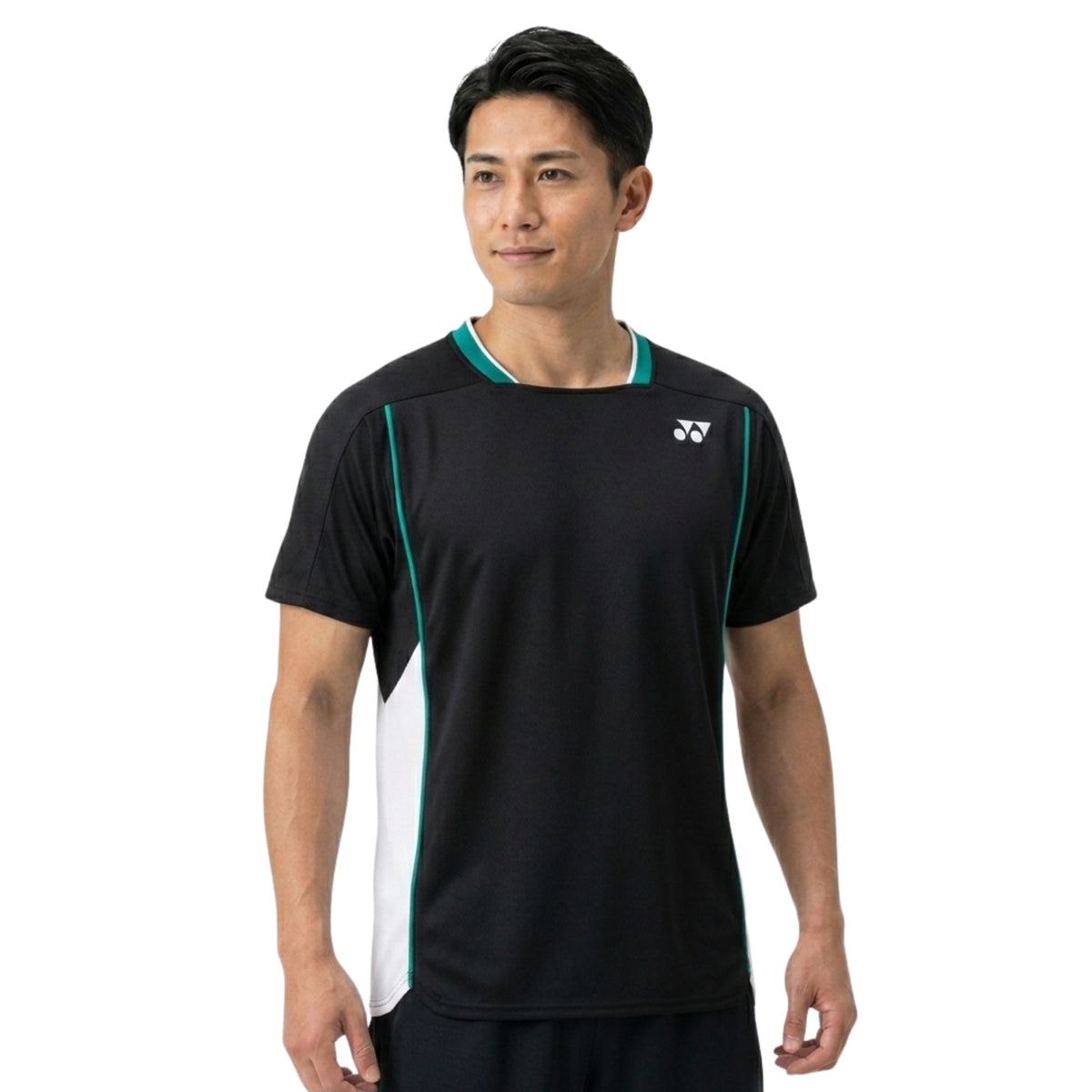 Man wearing a black and green Yonex shirt with a visible brand logo on a white background