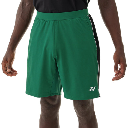 Green athletic shorts with a Yonex logo on a white background