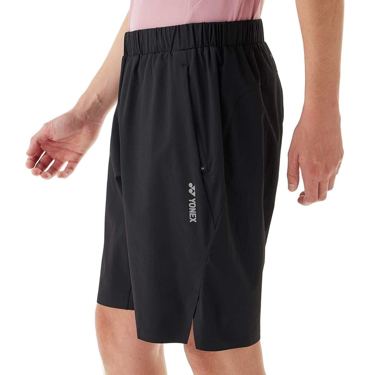 Black shorts with a Yonex logo on a white background