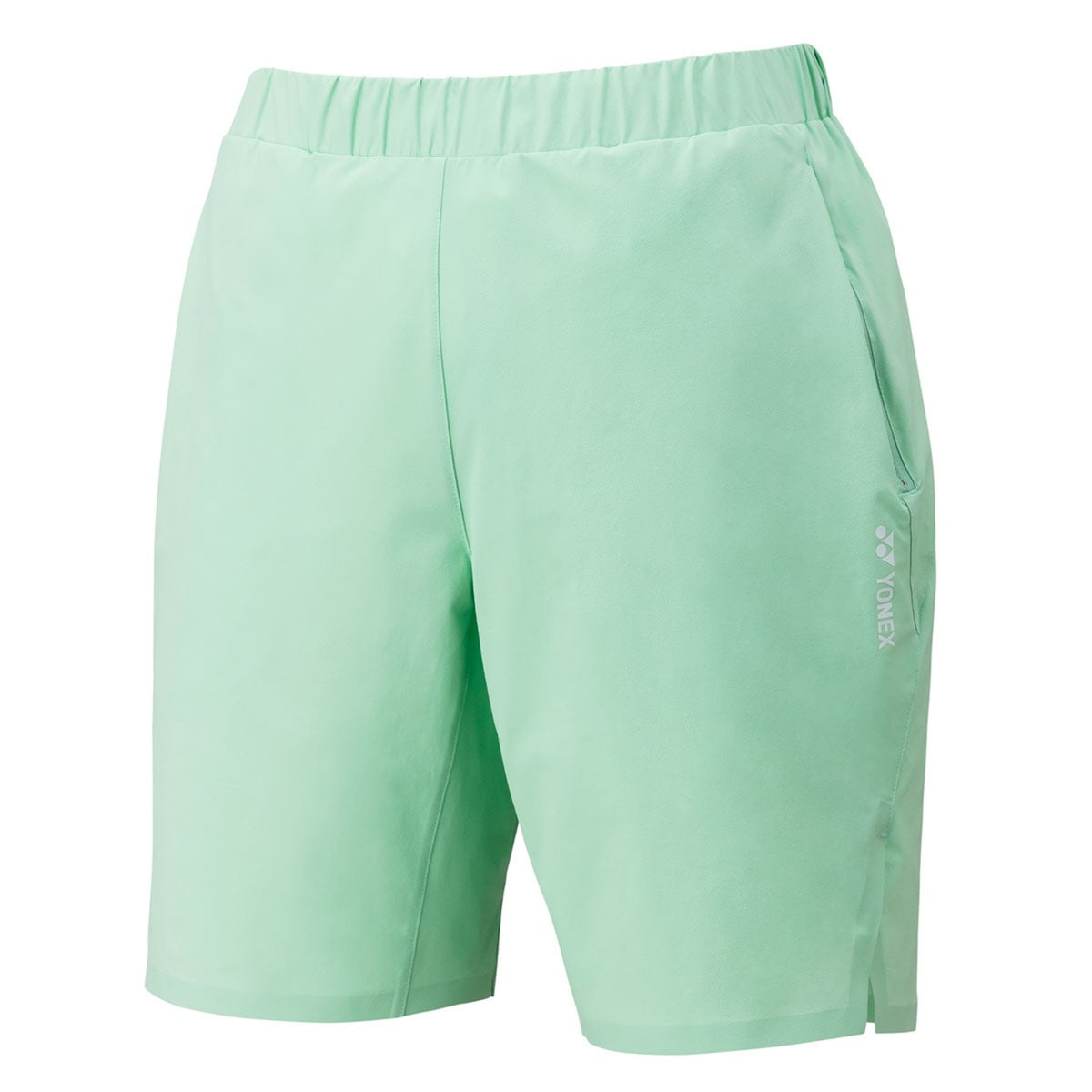 Light green shorts with a brand logo on a white background