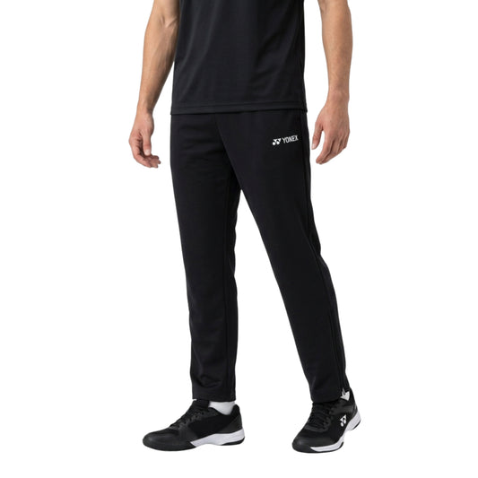 Person wearing black Yonex athletic pants on a white background