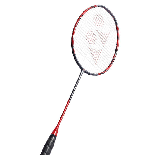 Red and black badminton racket on a white background