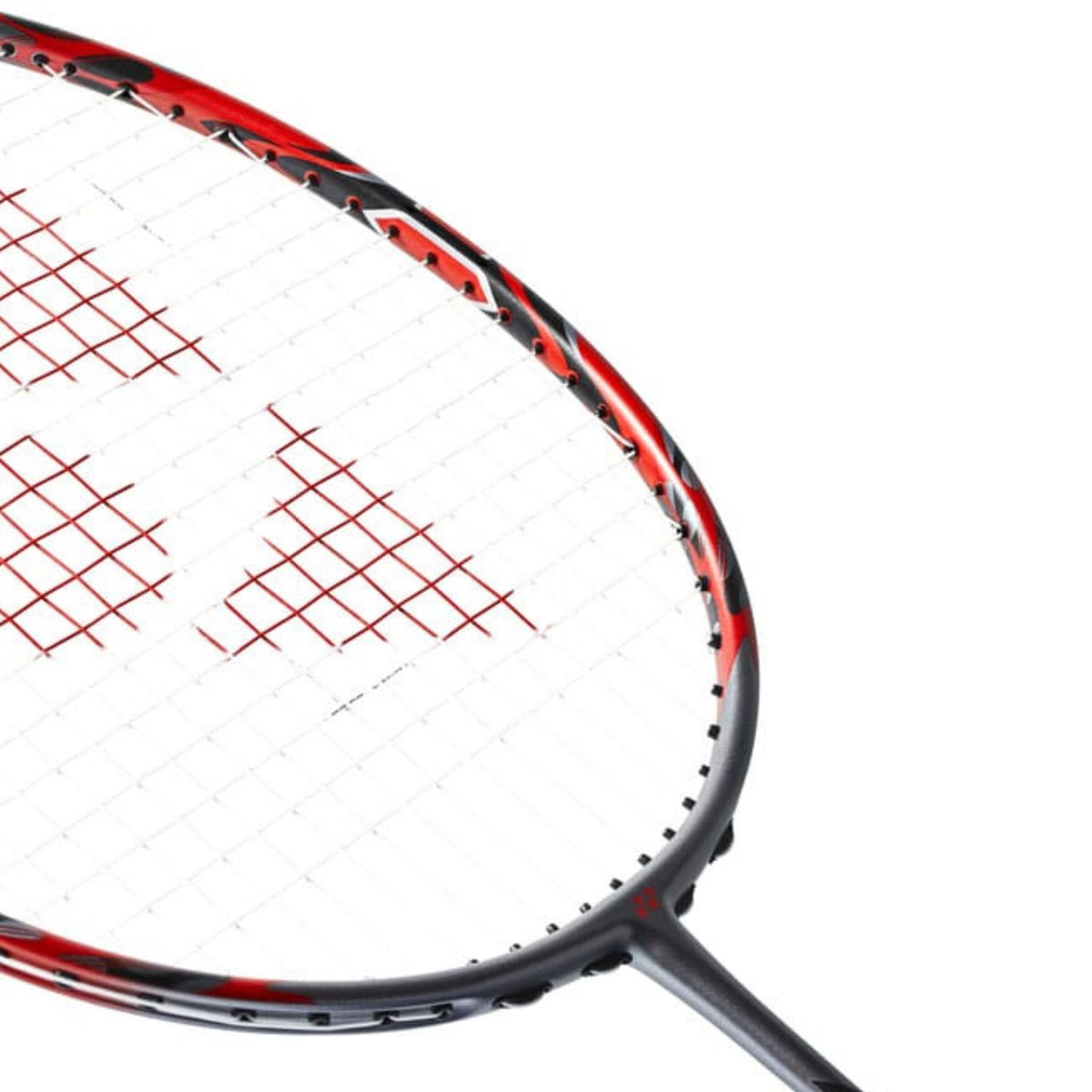 Close-up of a red and black badminton racket with white strings on a white background