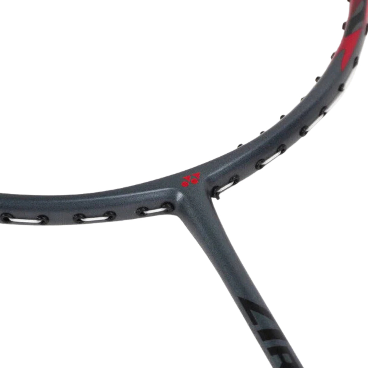 Close-up of a badminton racket with a brand logo on a white background