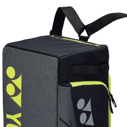 Black and gray bag with yellow accents and visible branding on a white background