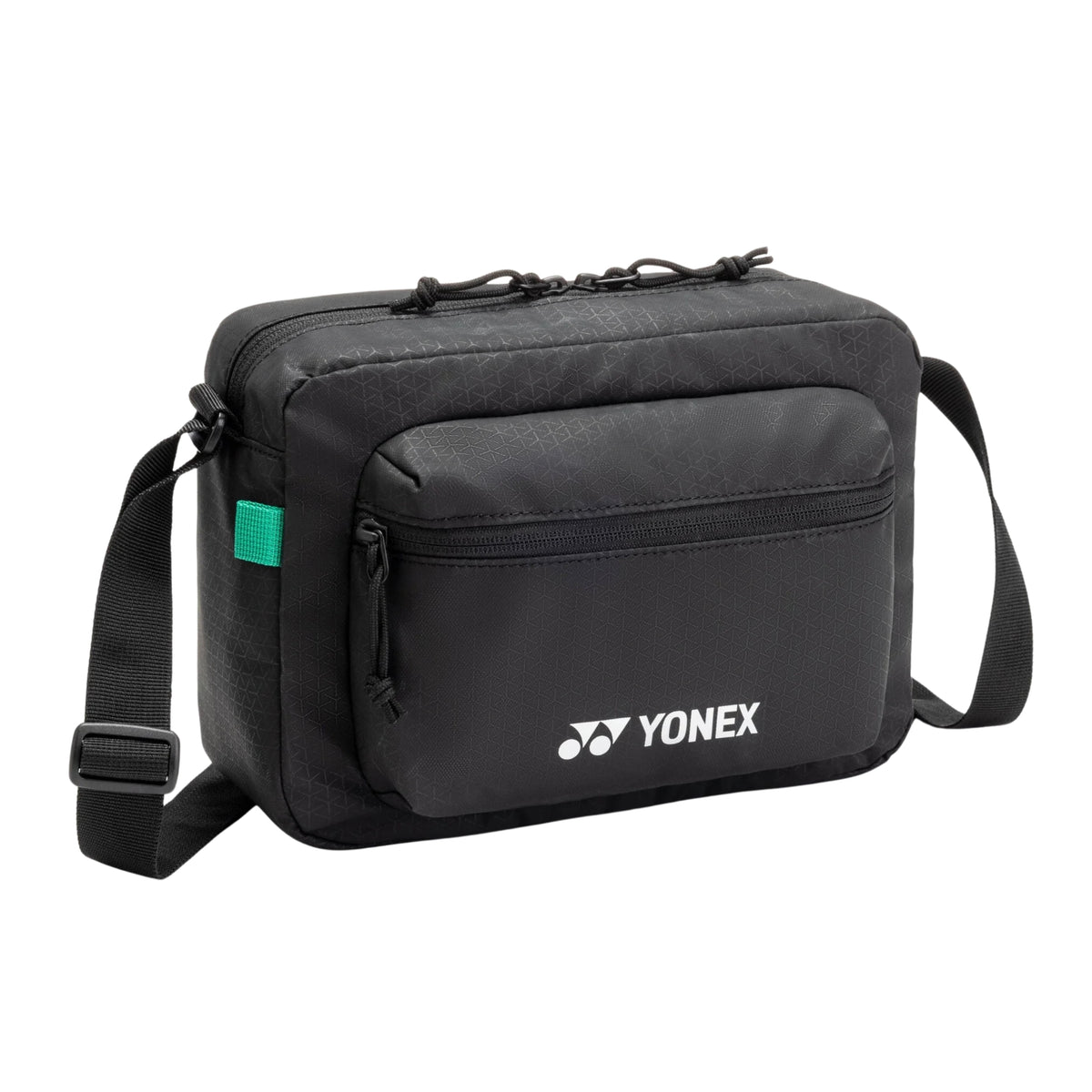 Black Yonex bag with a green tag on a white background