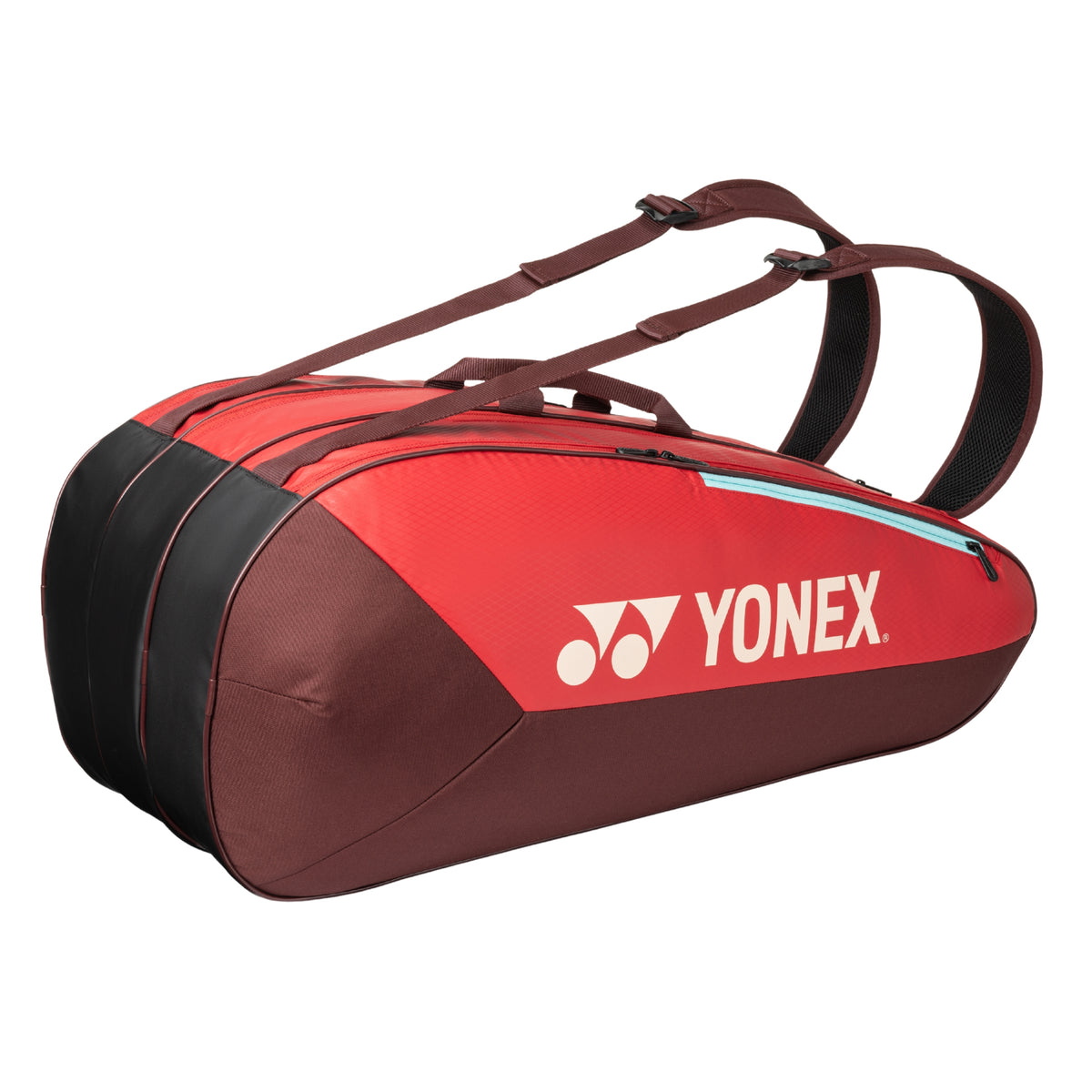 Red and brown Yonex tennis bag on a white background