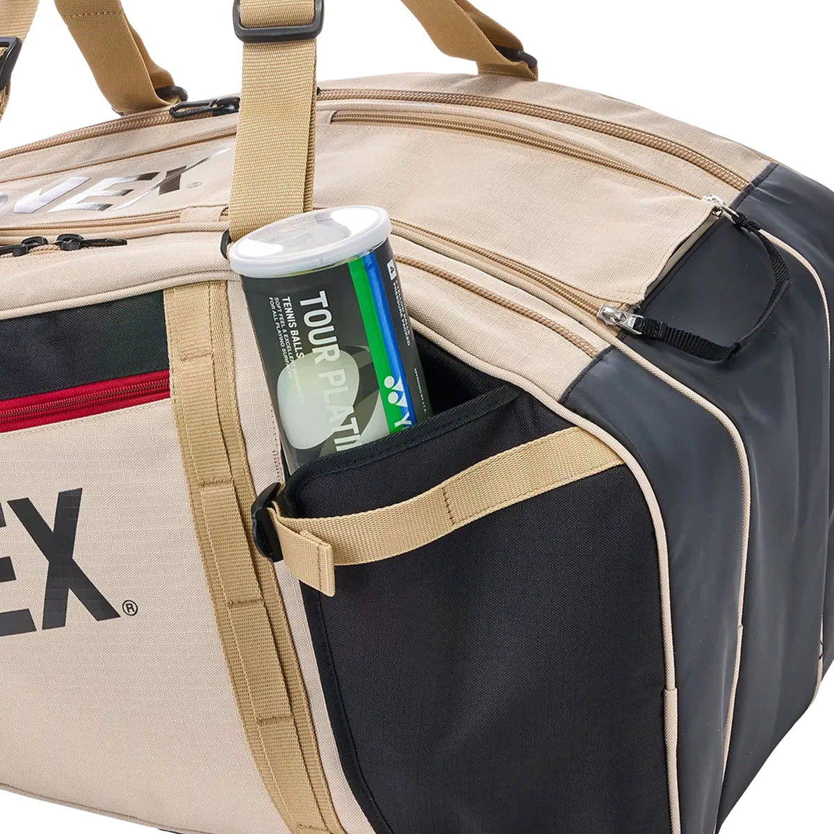Beige and black racket bag with a visible brand logo, containing a can of tennis balls.