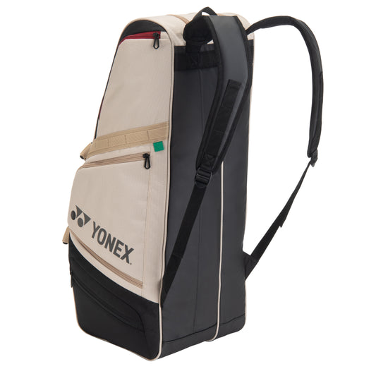 Yonex tennis bag with beige and black design on a white background