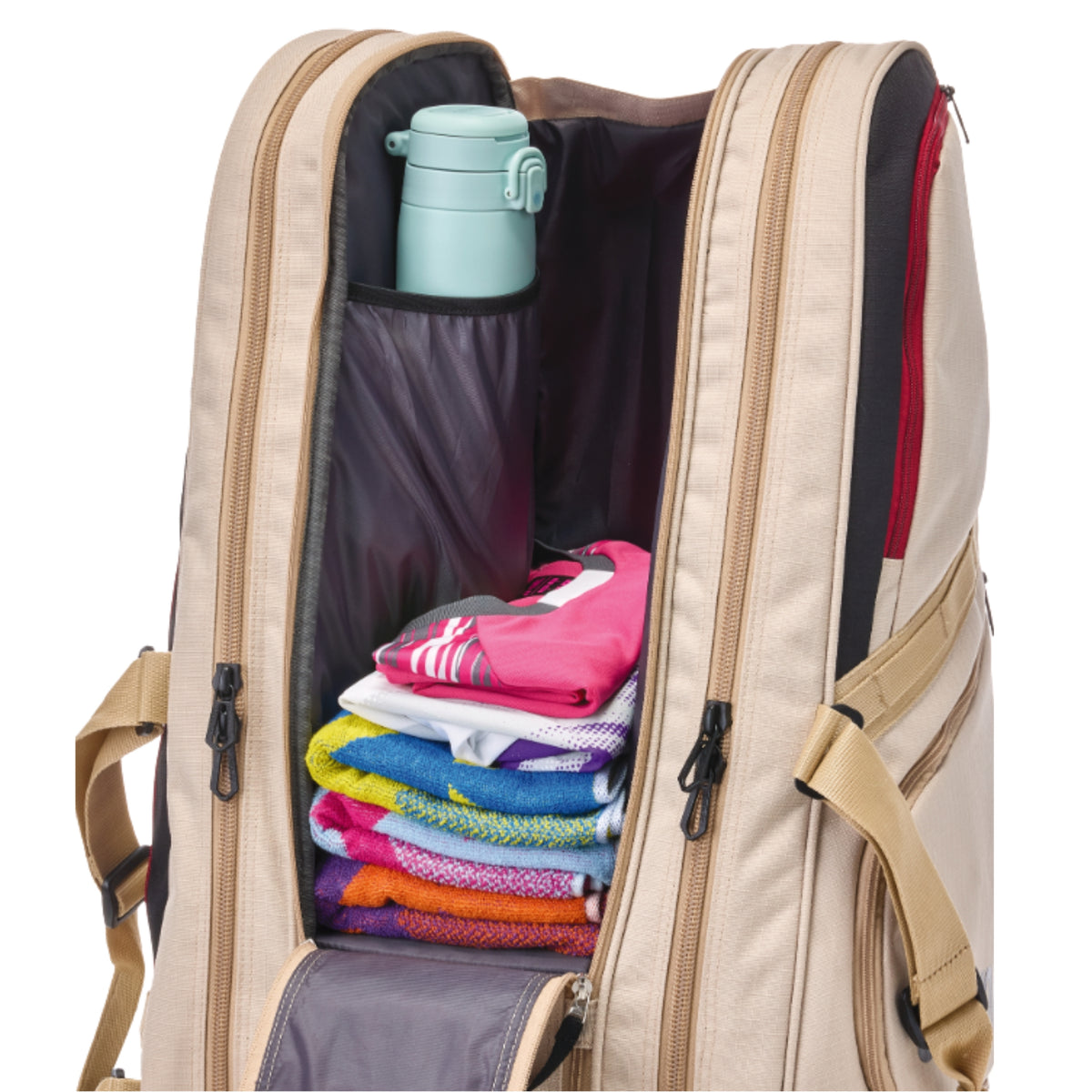 Beige racket bag with clothes and a water bottle inside on a white background