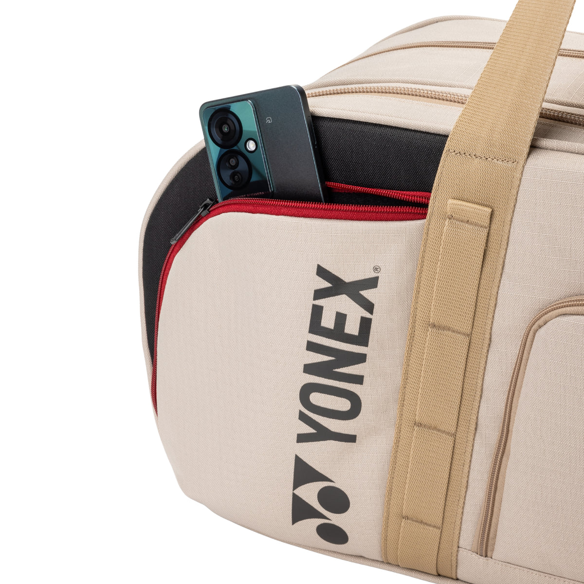 Yonex bag with a phone inside on a white background