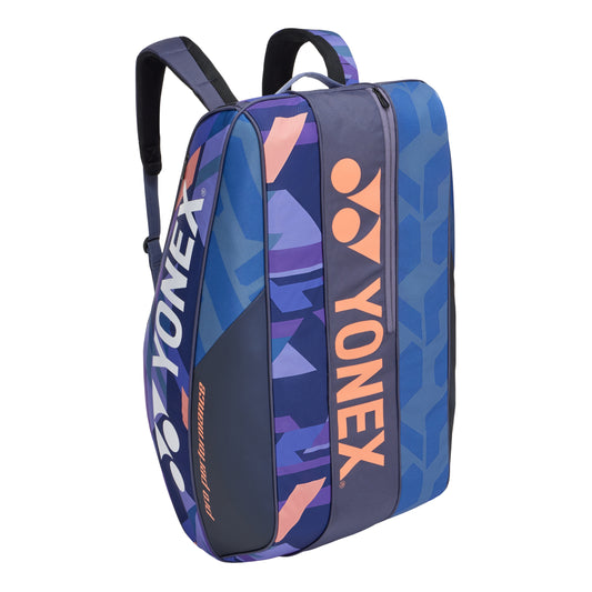 Blue and purple Yonex racket bag on a white background