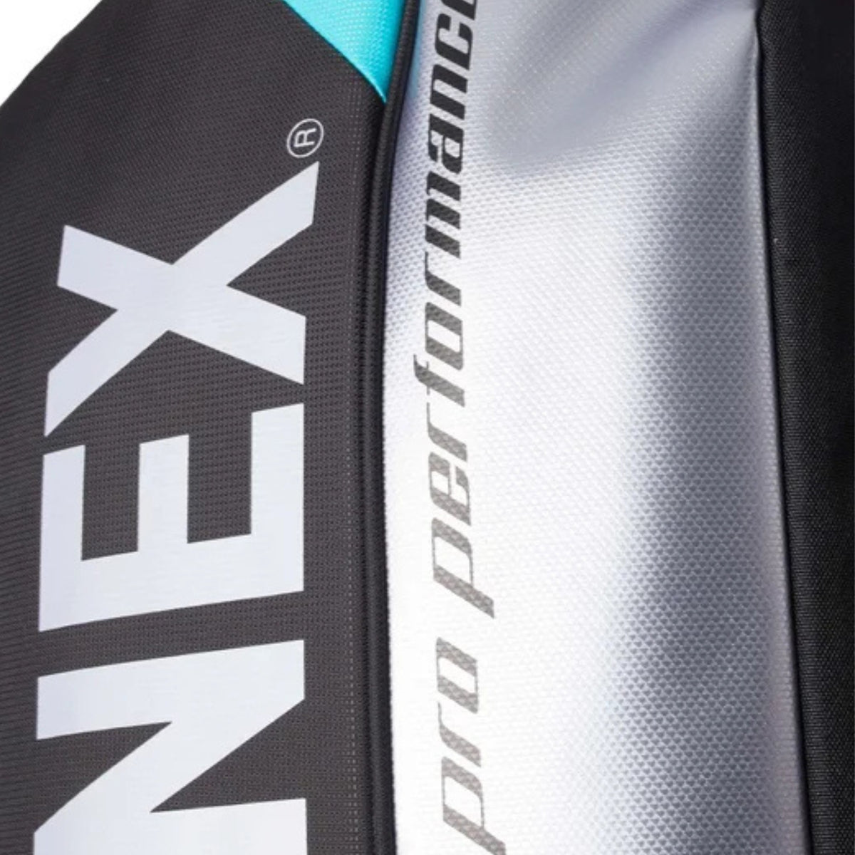 Close-up of a tennis bag with 'Yonex' and 'Pro Performance' branding.