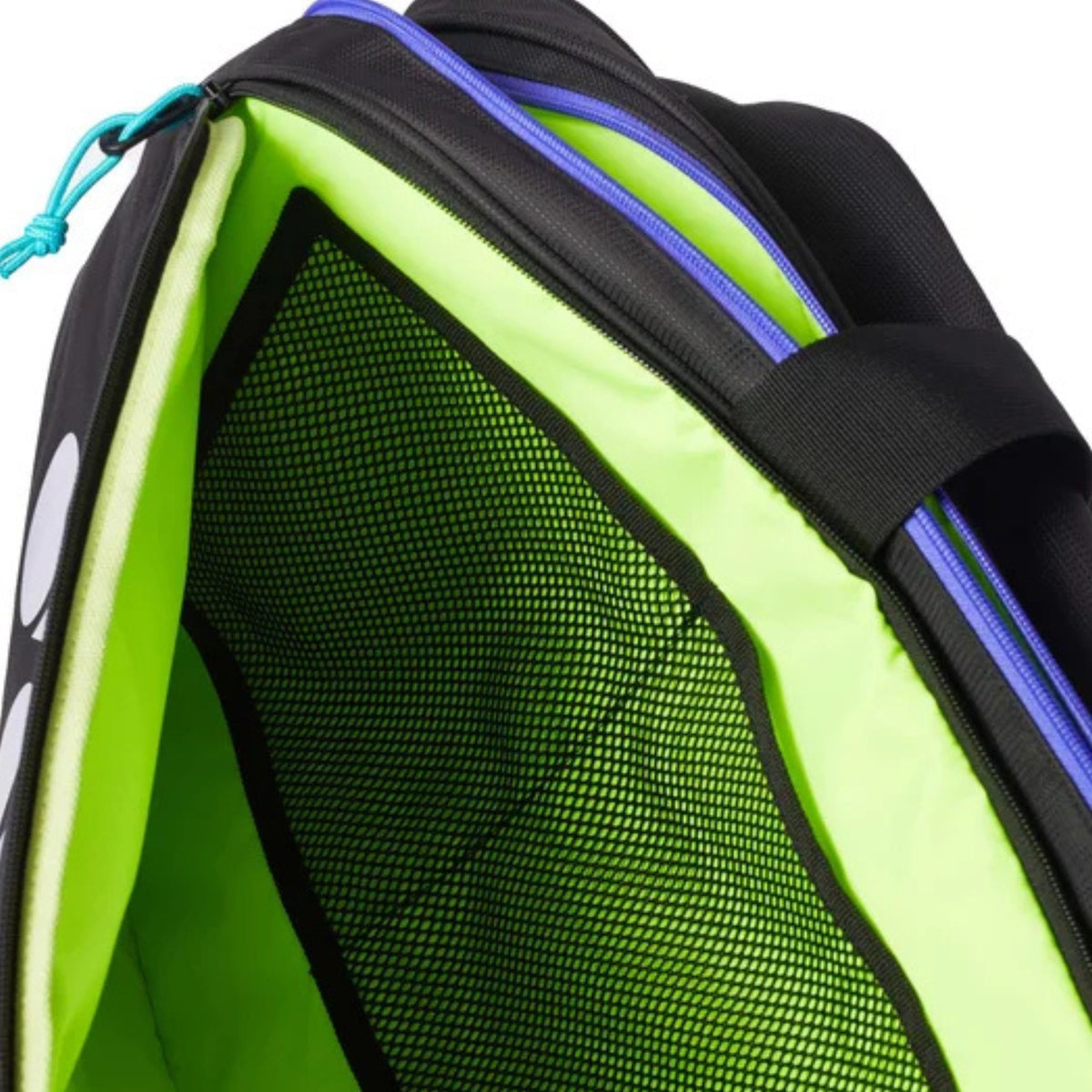 Close-up of a green and black tennis bag with blue accents