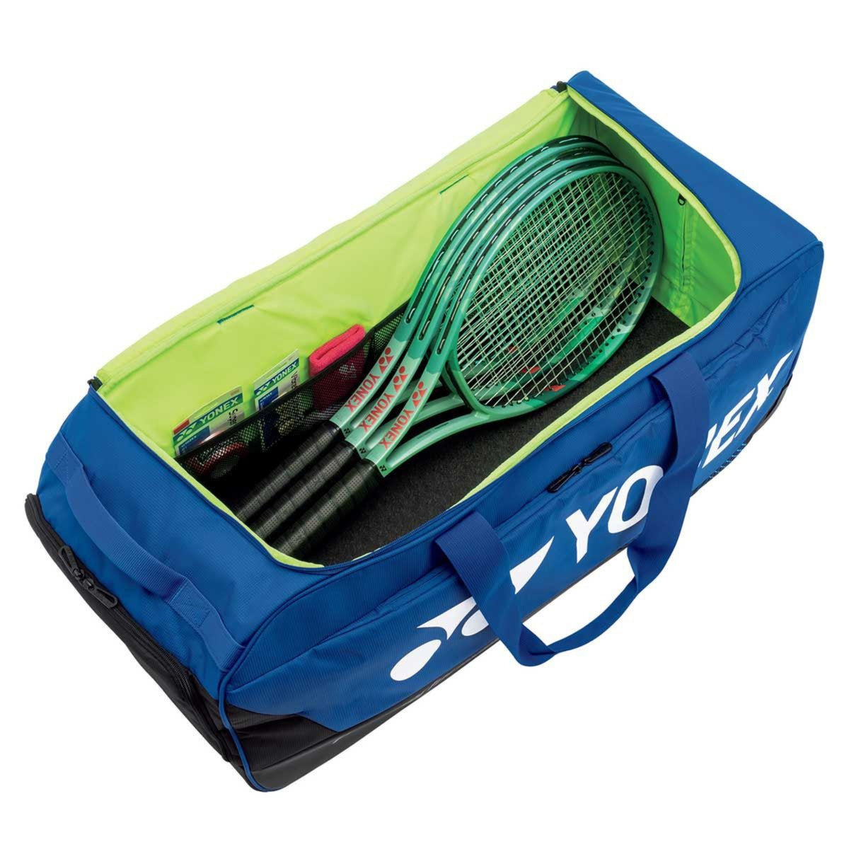 Blue and green Yonex trolley bag with tennis rackets and accessories on a white background