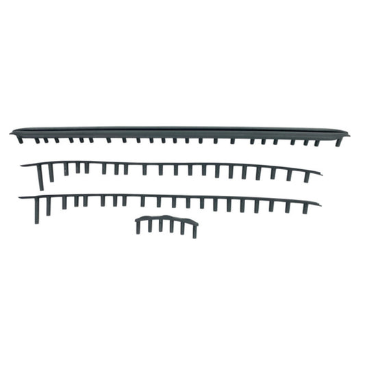 Set of black Yonex grommets on a white background