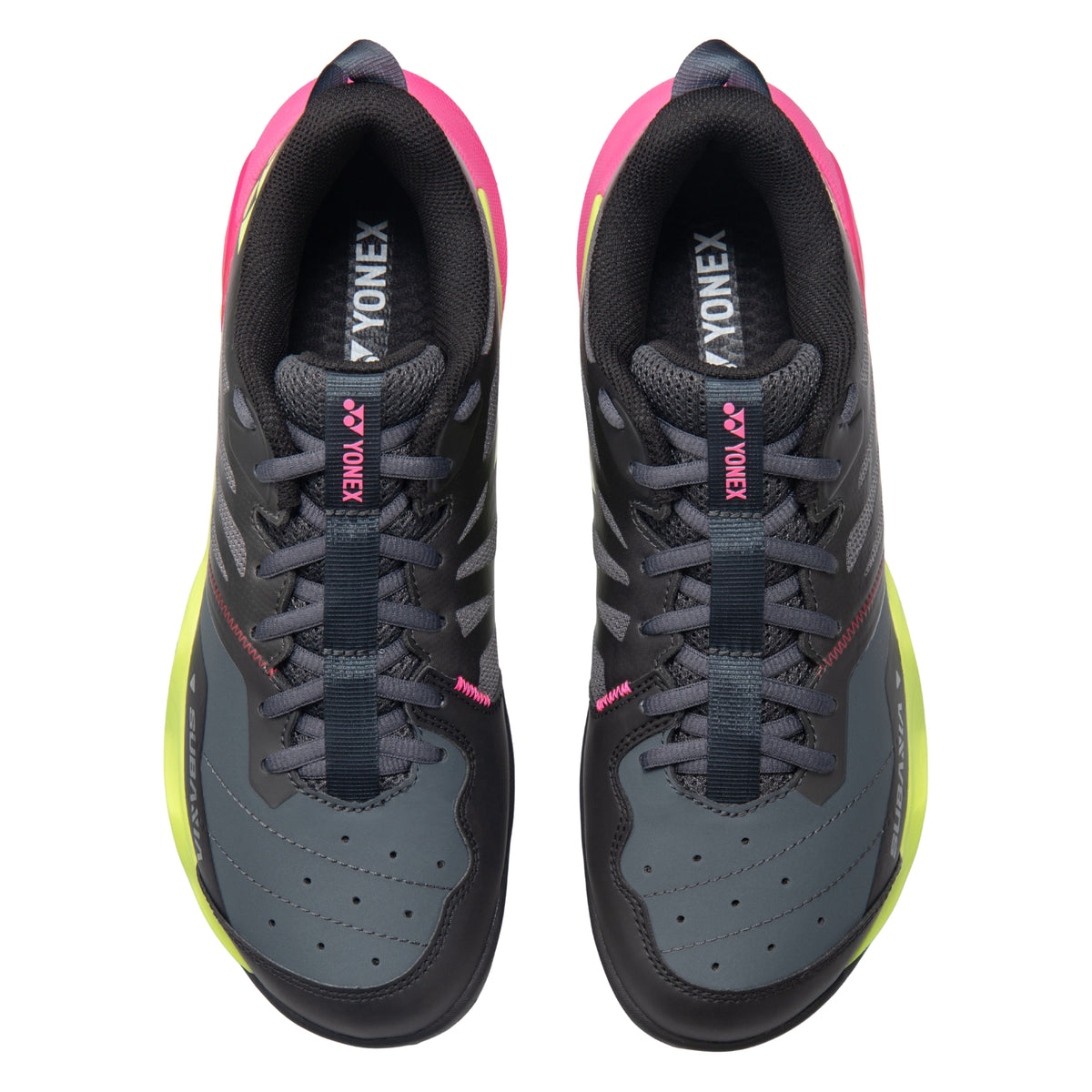 Pair of Yonex tennis shoes on a white background
