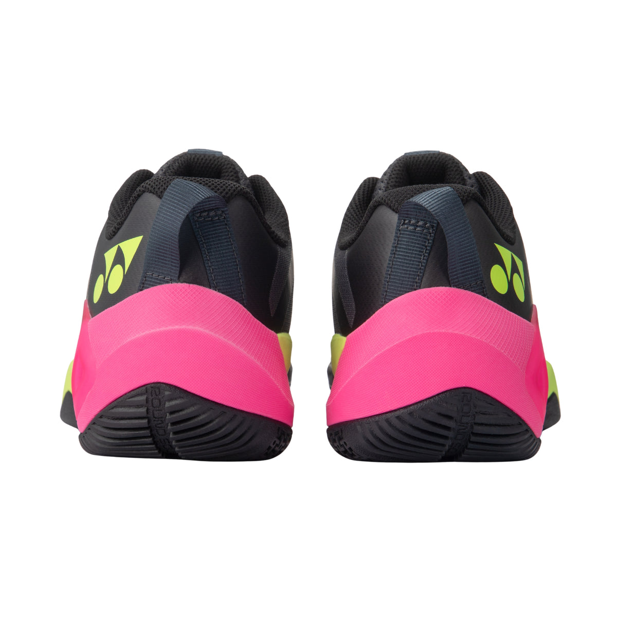 Black and pink Yonex tennis shoes with a brand logo on a white background