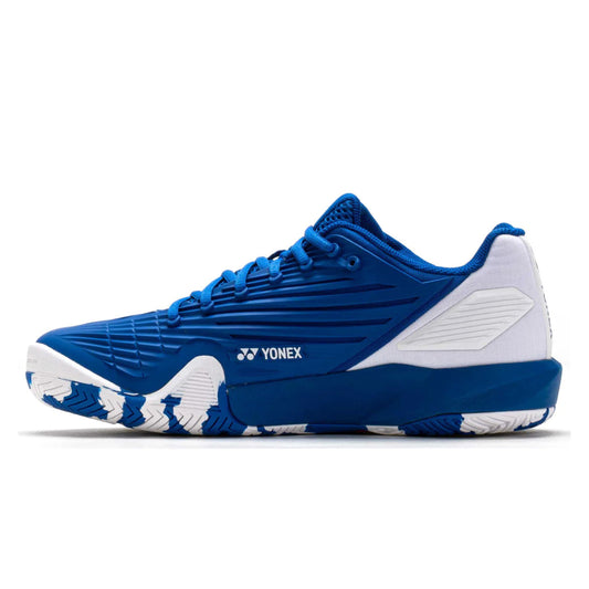 Blue and white tennis shoe with brand logo on a white background
