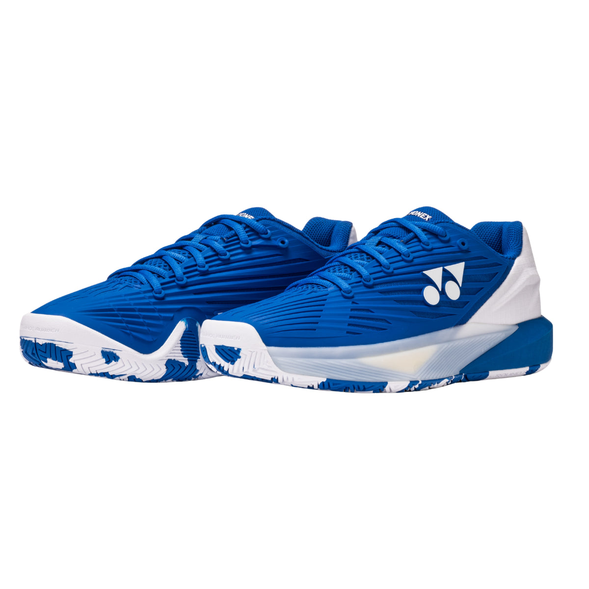 Pair of blue Yonex tennis shoe on a white background