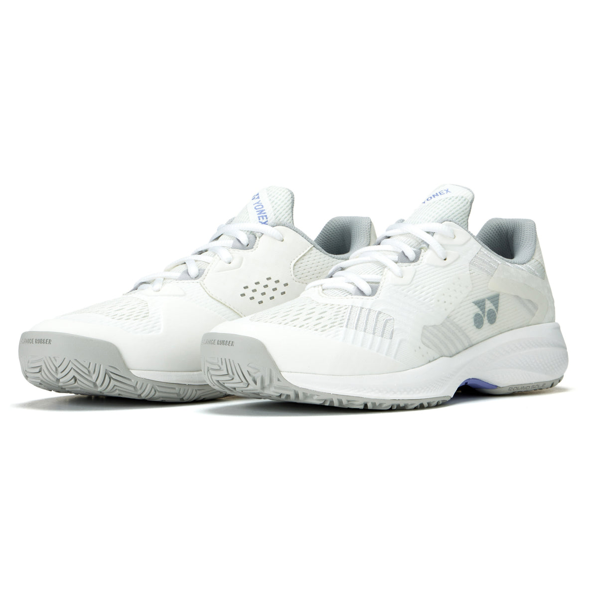 White Yonex tennis shoes with brand logo on a white background