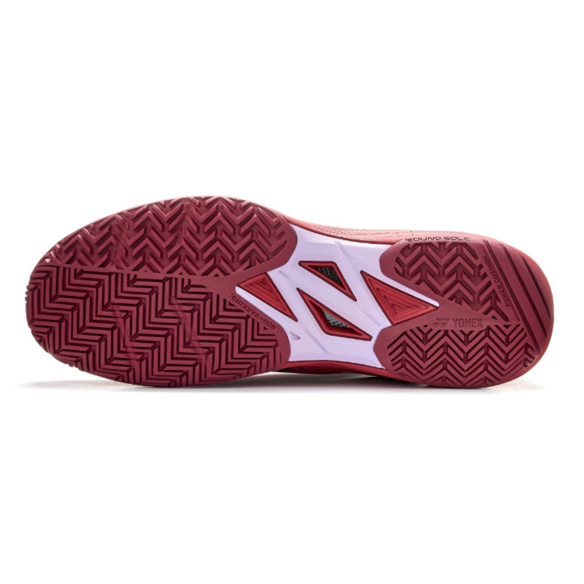 Red tennis shoe sole with brand logo on a white background