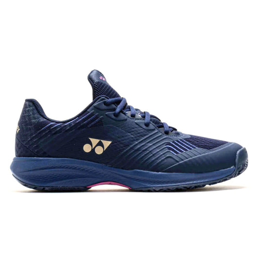 Navy blue Yonex tennis shoe with brand logo on a white background