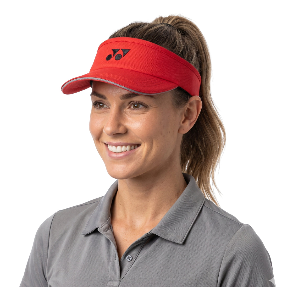 Woman wearing a red visor with a white background