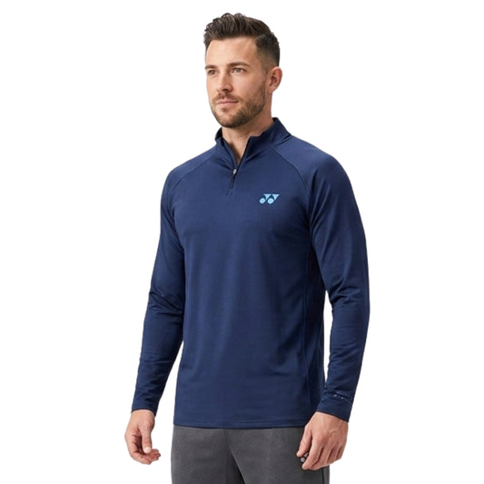 Man wearing a navy long-sleeve shirt with a brand logo on a white background