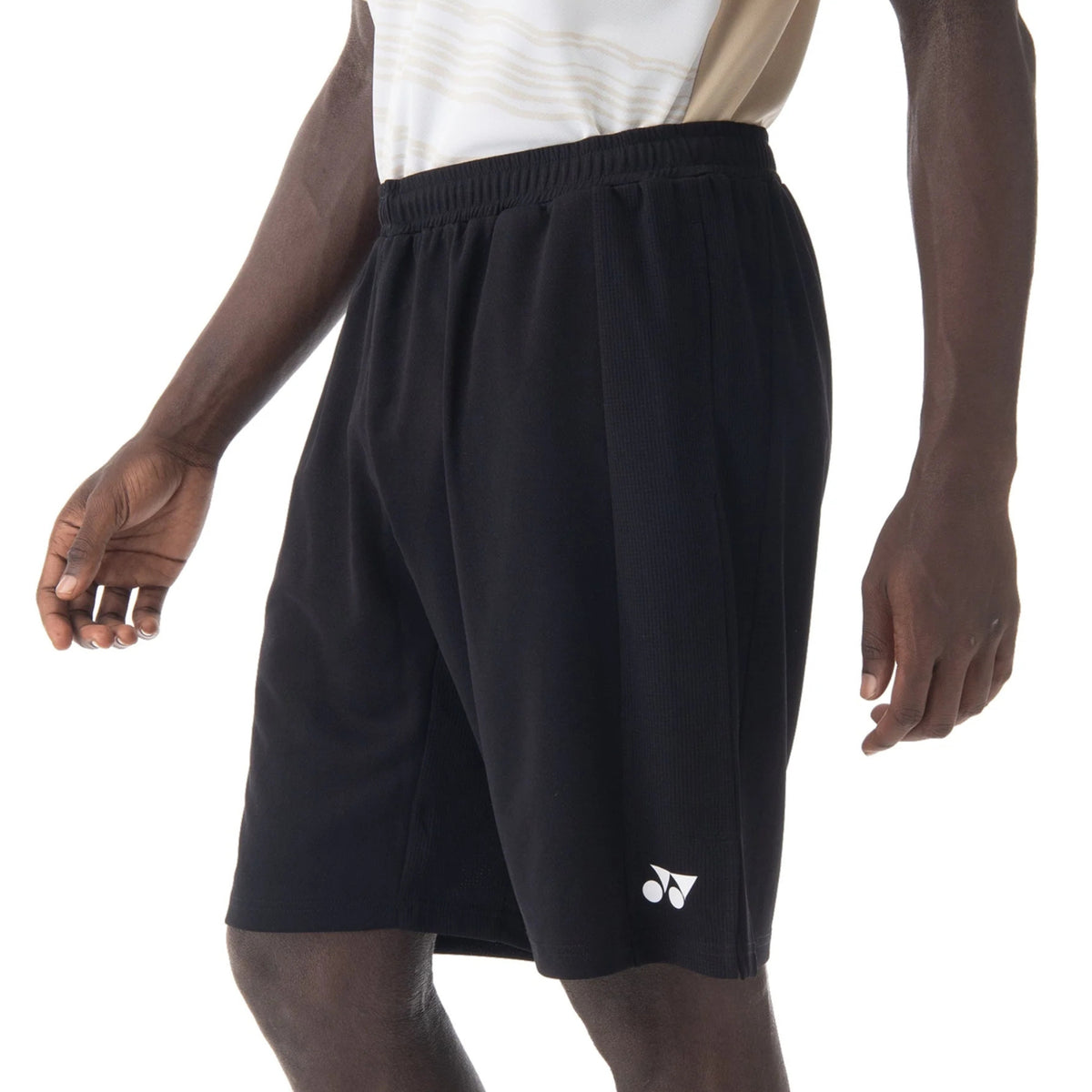 Black shorts with a brand logo on a white background
