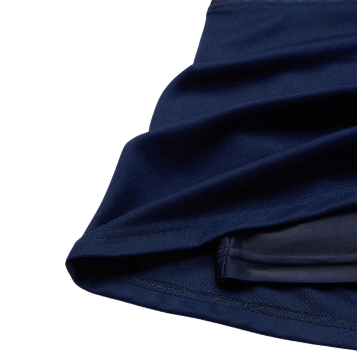 Close-up of a blue Yonex skirt on a white background